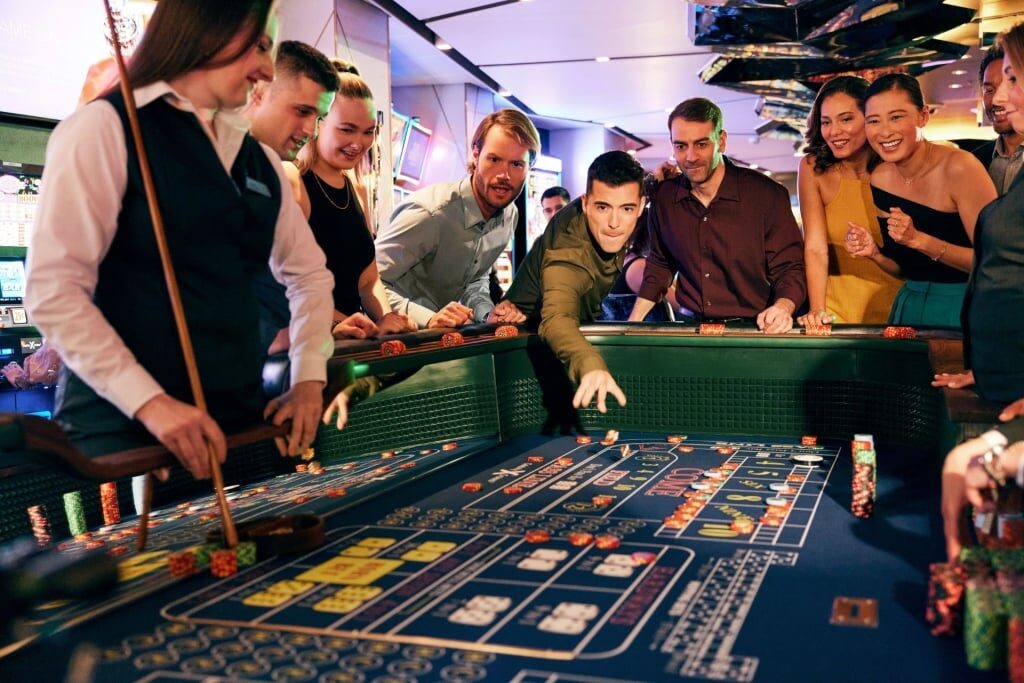 People at the casino aboard Celebrity Cruises